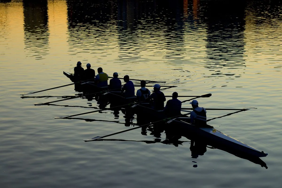 A canoe team of 9 representing optimal agile team size